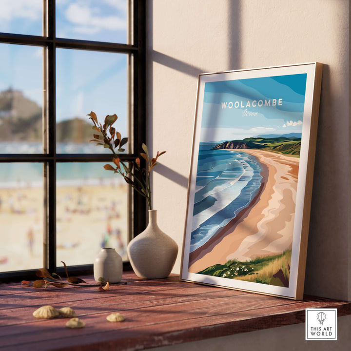 Woolacombe Devon beach sunset poster framed by window, showcasing rolling waves and golden sands.