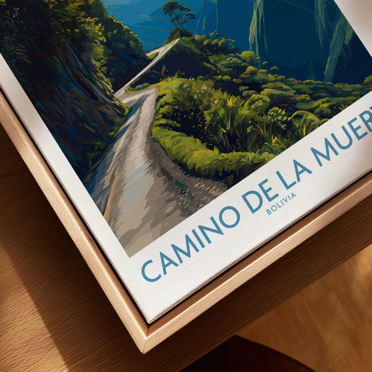 Camino de la Muerte Bolivia Cliff Road Wall Art — the Yungas cliff road curving along a jungle mountainside above the Bolivian Andes, shown as closeup framed canvas natural wood floating frame