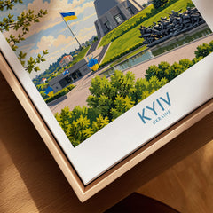 Kyiv Ukraine Spring Blossom Wall Art — the Motherland Monument under spring blossom with the Ukrainian flag flying, shown as closeup framed canvas natural wood floating frame