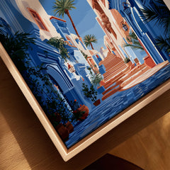 Rabat Morocco Blue Medina Travel Poster — a blue-washed medina lane and stone steps seen through a horseshoe arch, shown as closeup framed canvas natural wood floating frame