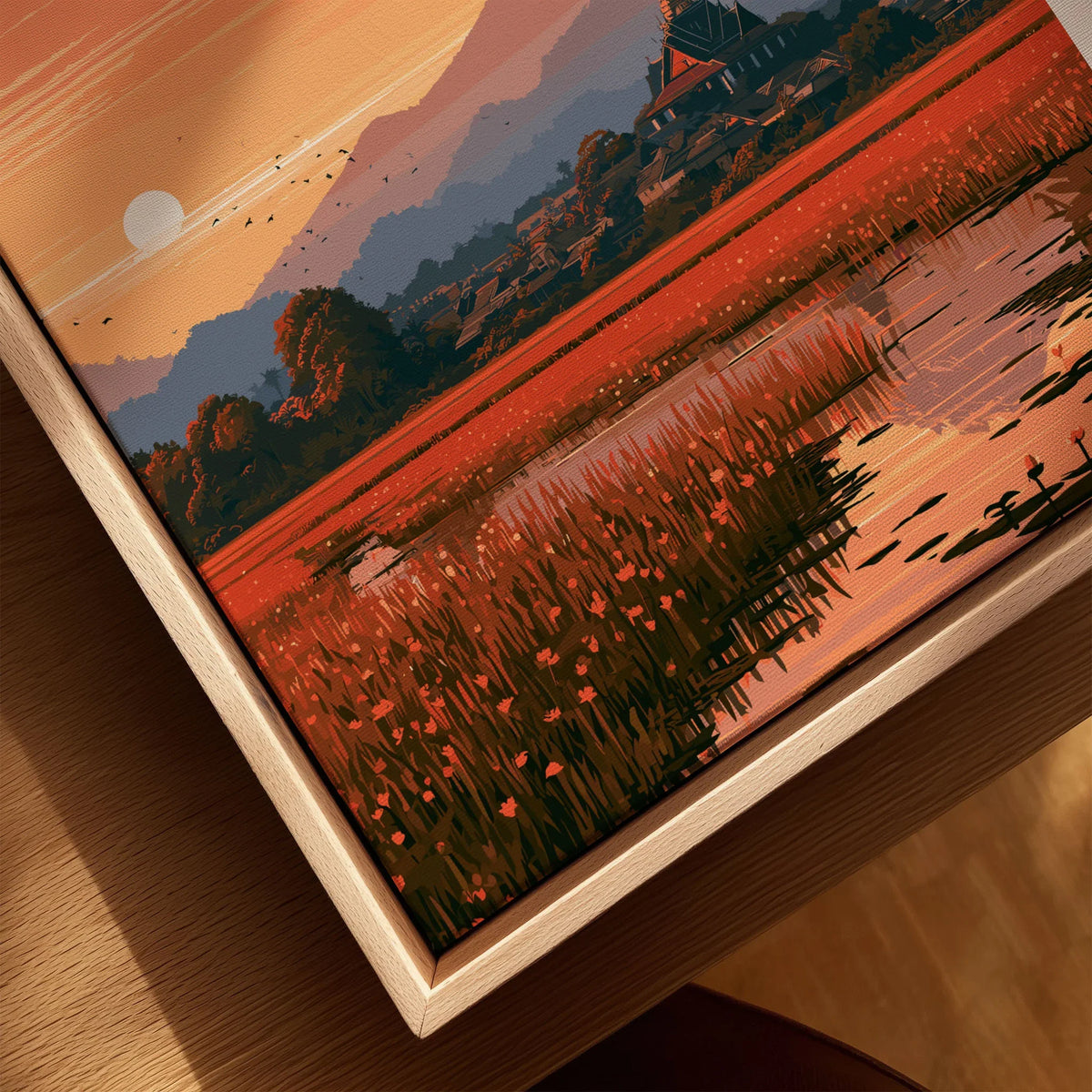 Suphan Buri Thailand Lotus Lake Travel Poster — a lotus-covered lake and temple spire at sunset beneath a mountain peak, shown as closeup framed canvas natural wood floating frame