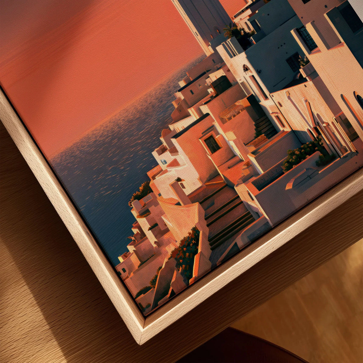 Tangier Morocco Golden Hour Travel Poster — a whitewashed hillside town and minaret glowing above the sea at sunset, shown as closeup framed canvas natural wood floating frame