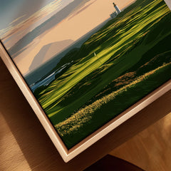 Turnberry Scotland Ailsa Craig Travel Poster — Ailsa Craig and the white lighthouse across rolling coastal turf at dusk, shown as closeup framed canvas natural wood floating frame