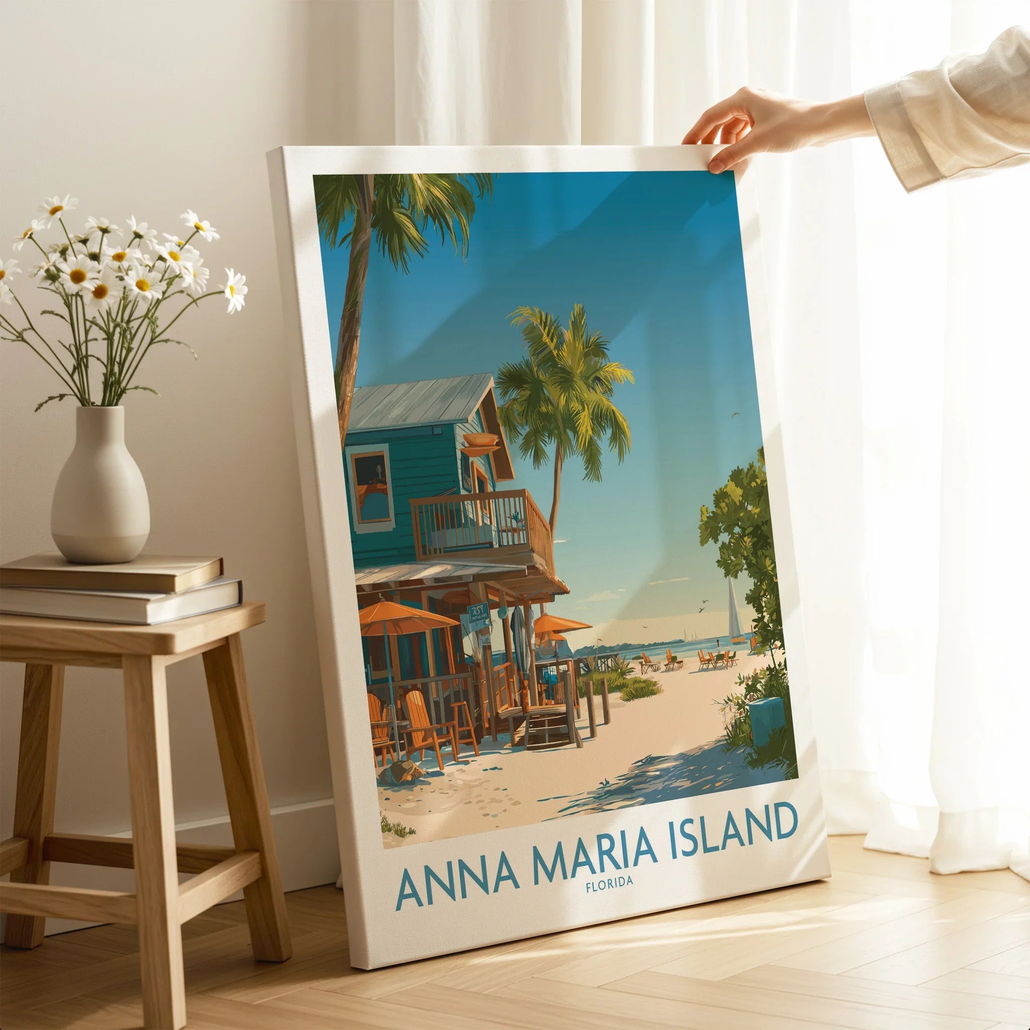 Anna Maria Island Florida canvas print with beach house and palm trees, hand holding artwork in modern room