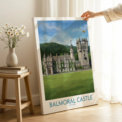 Hand holding Balmoral Castle Scotland travel poster canvas print in bright living room