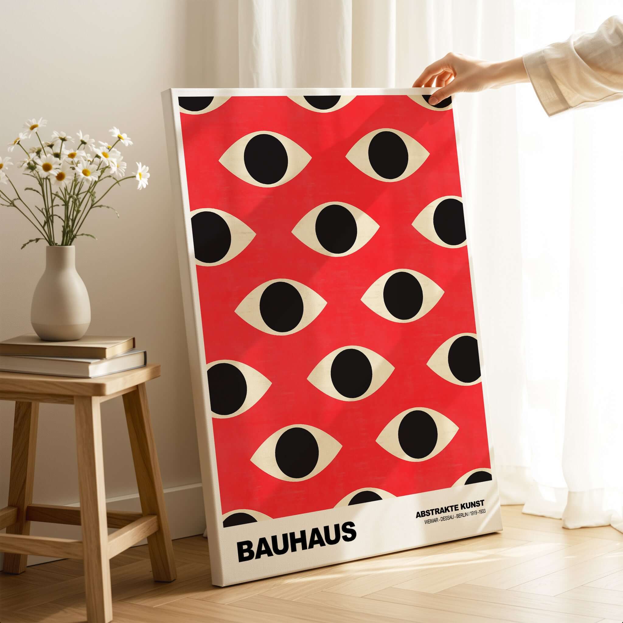 Bauhaus Exhibition Prints - Repeating Eyes Pattern Poster Red Black Cream Art displayed in a modern interior setting.