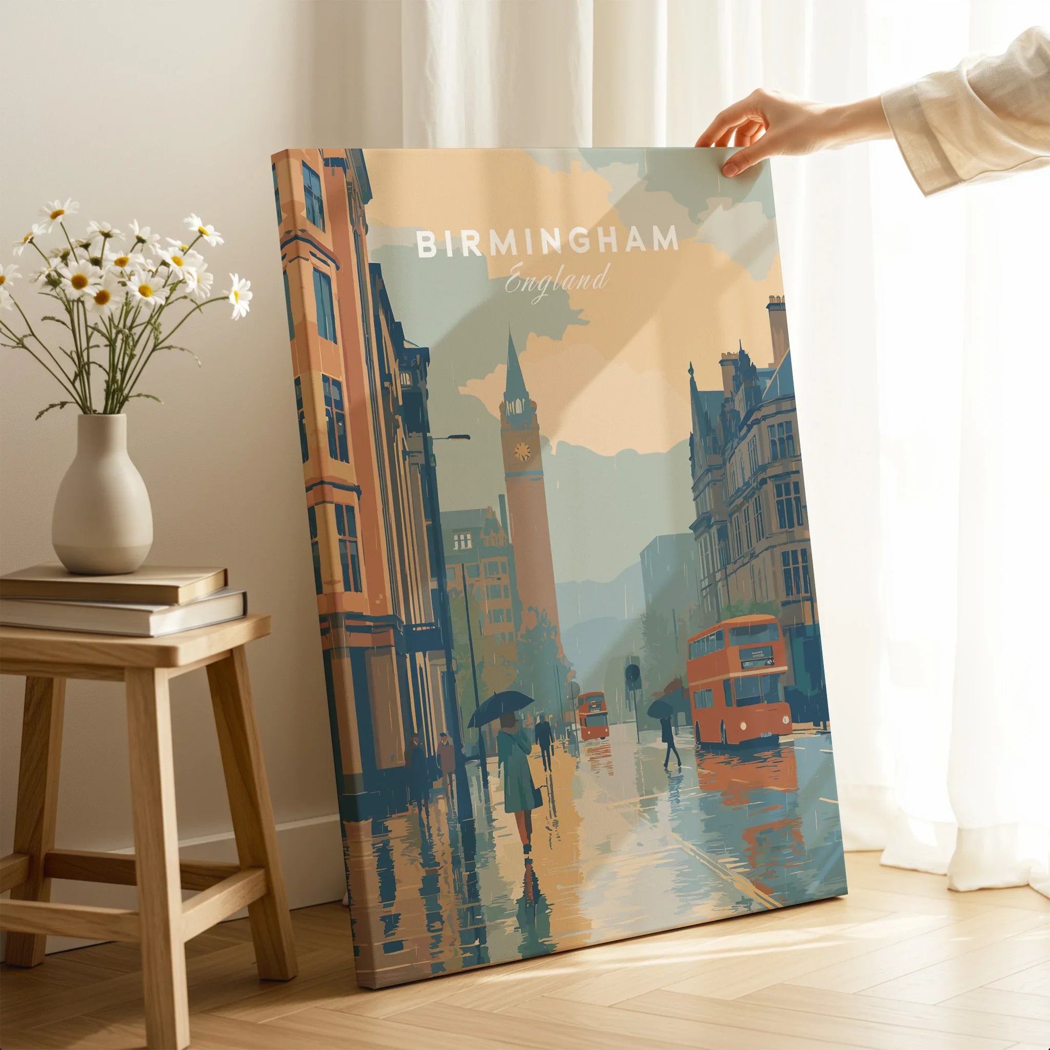 Hand holding Birmingham England travel poster canvas print with rainy cityscape, home decor