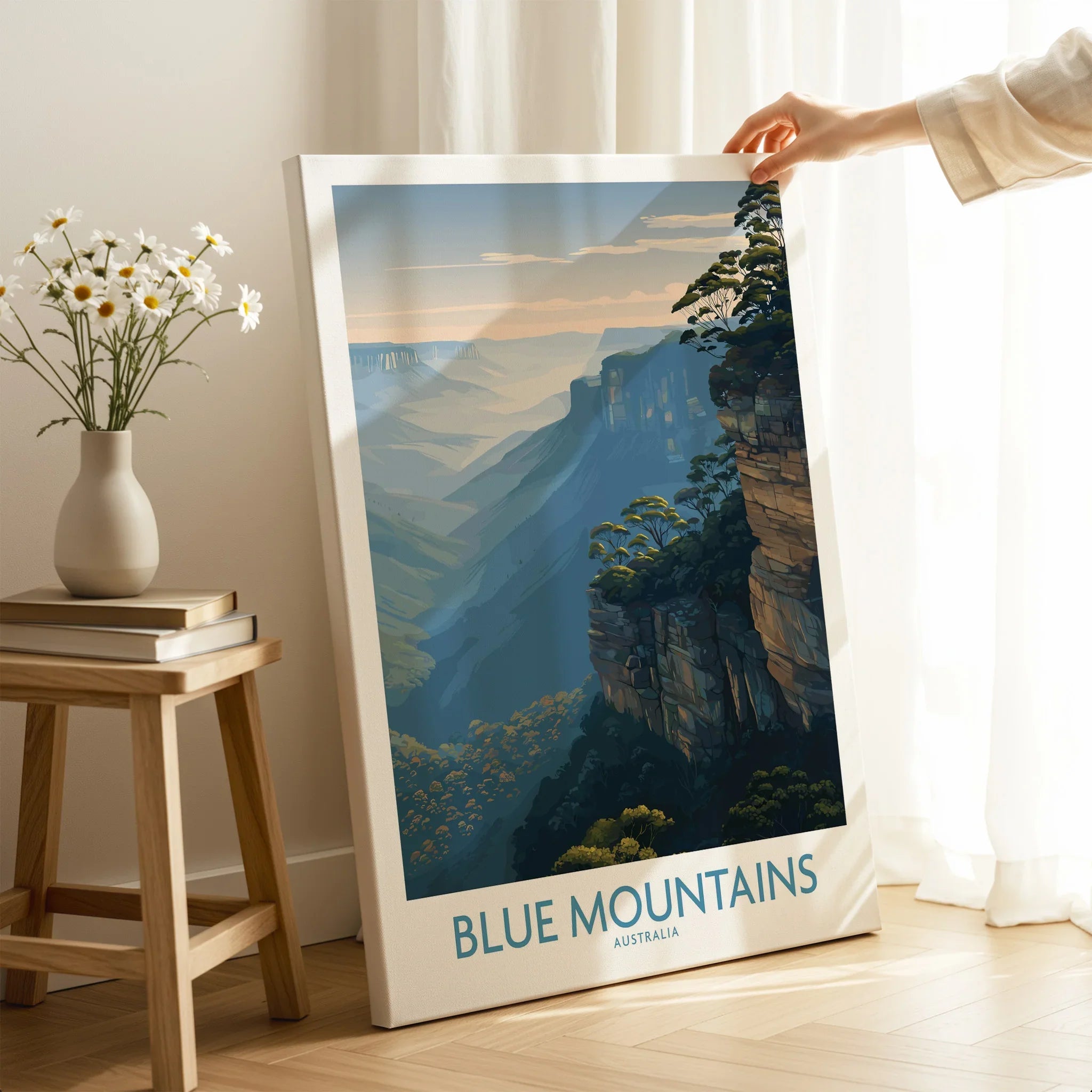Blue Mountains Australia wall art poster on canvas, hand holding print in cozy room setting