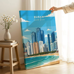 Busan South Korea city skyline canvas print held in modern living room with beach and ocean view