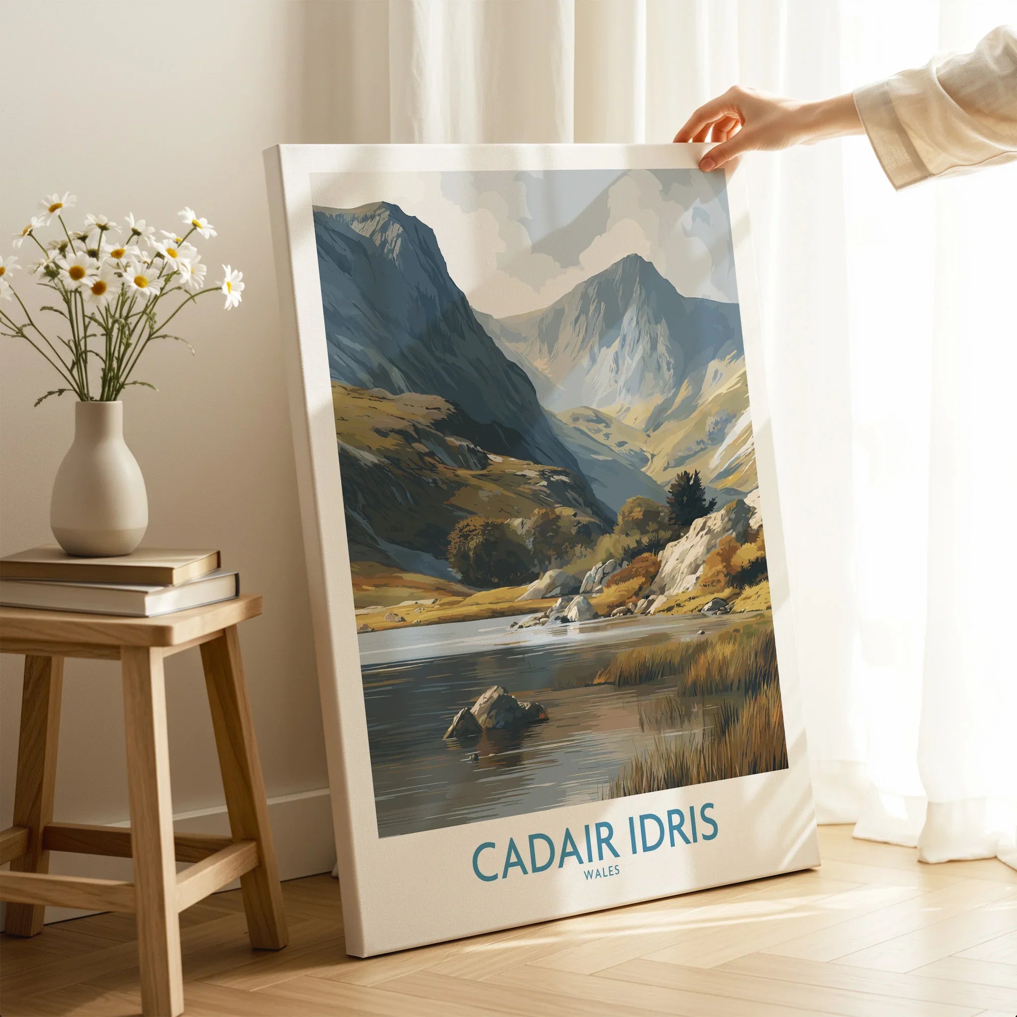 Canvas print of Cadair Idris Wales landscape, hand holding artwork in modern home setting