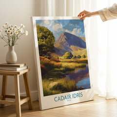 Hand holding Canvas print of Cadair Idris Wales mountain landscape in bright modern room
