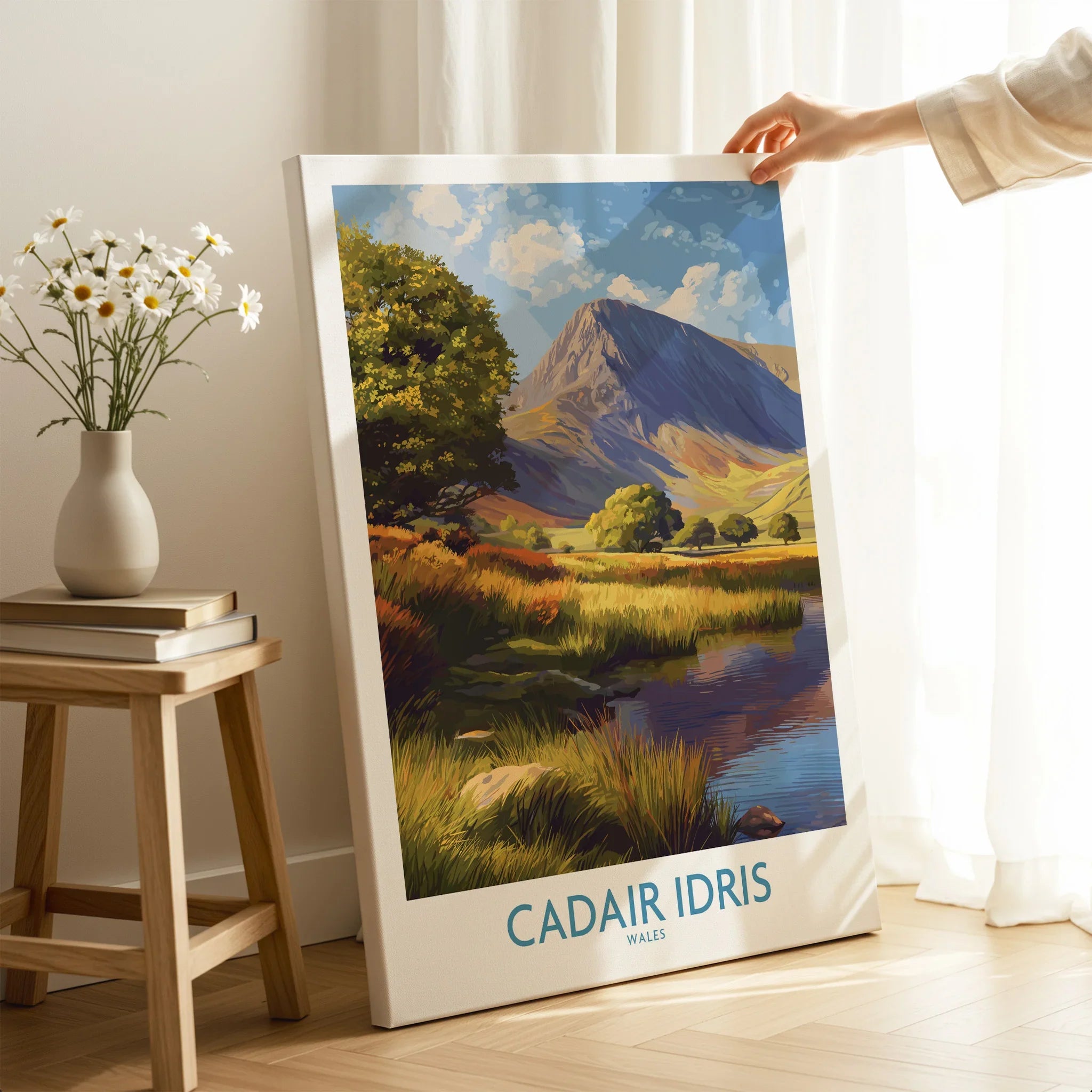 Hand holding Canvas print of Cadair Idris Wales mountain landscape in bright modern room