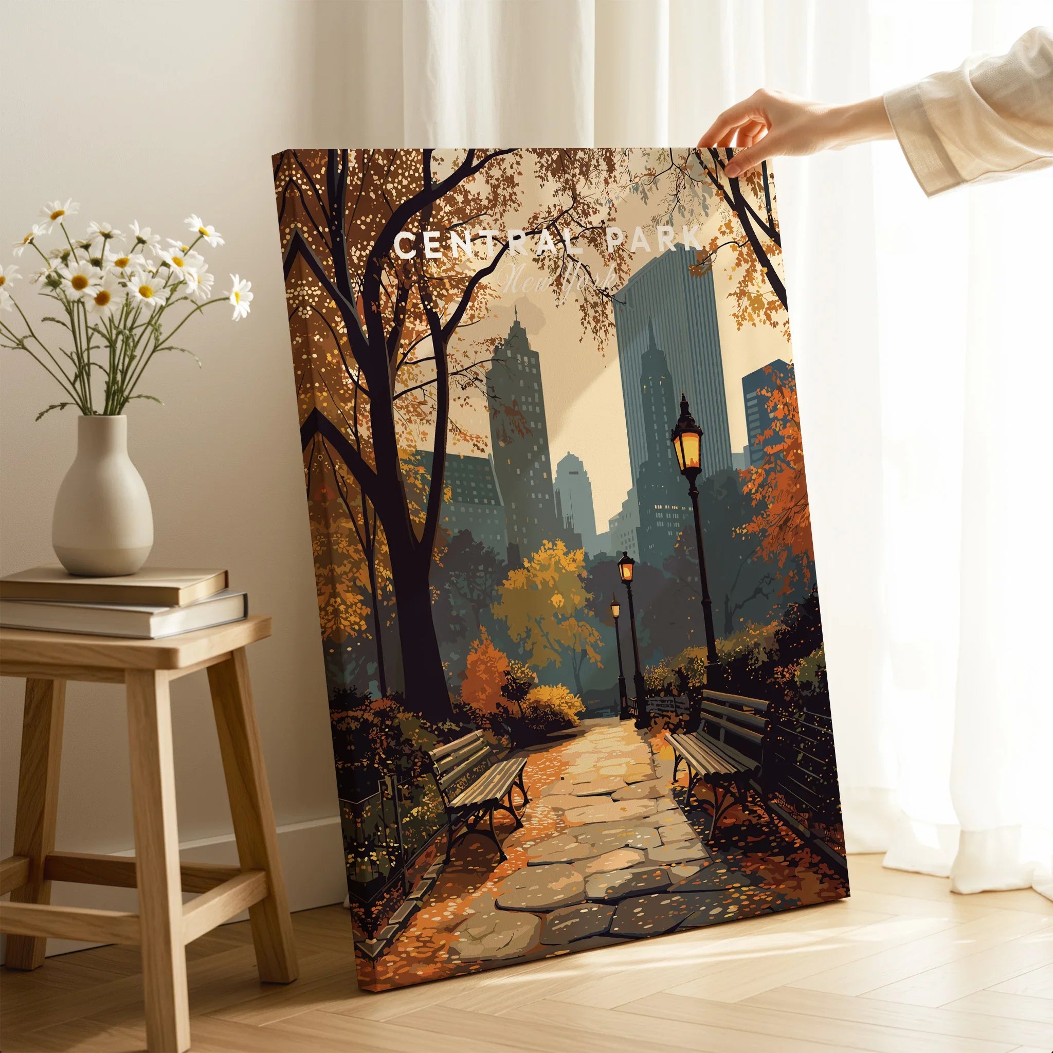 Central Park canvas wall art with autumn path, benches, and city skyline in a cozy room setting