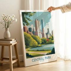 Central Park New York canvas print with city skyline, hand holding artwork in modern home setting.