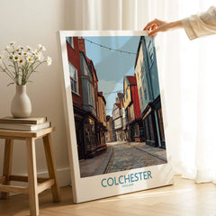 Colchester England wall art print with historic street scene in a cozy home interior