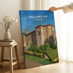 Colchester England travel poster canvas print with historic building, hand holding in cozy room