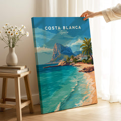 Costa Blanca Spain Travel Art – Mediterranean Village & Turquoise Sea Landscape Poster displayed in a cozy interior.