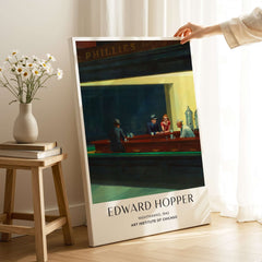 Edward Hopper Nighthawks 1942 Iconic Diner Art Print AIC Poster displayed in a modern home setting.