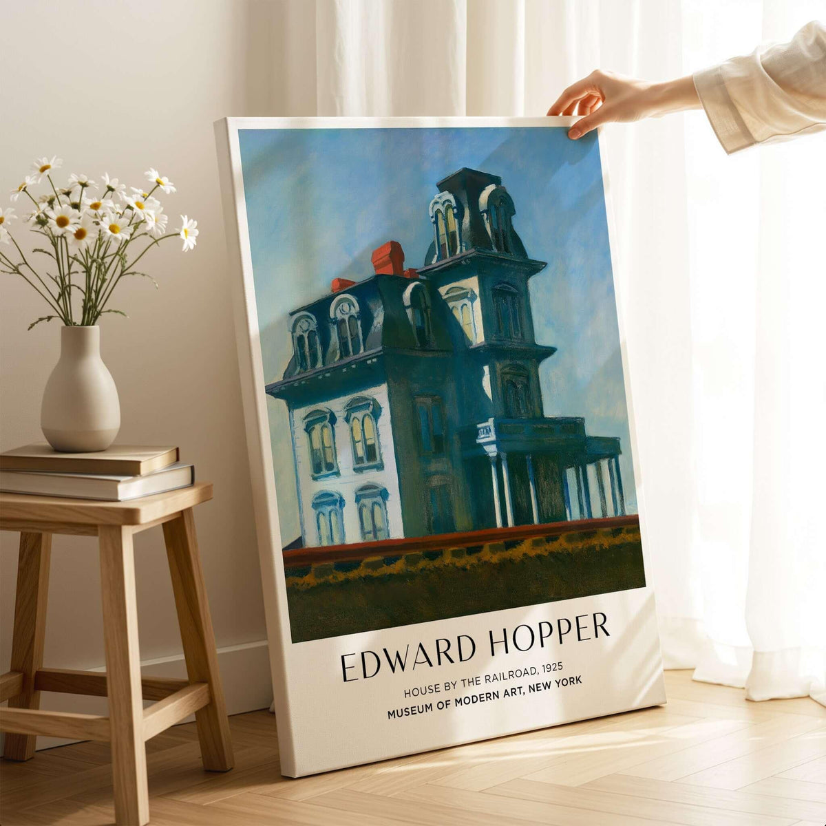 Edward Hopper House by the Railroad 1925 MoMA Art Print Poster displayed in a stylish interior setting.