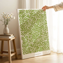 Exhibition Art Print William Morris Willow Pattern Green Botanical Wall Art displayed in a bright room with green leaf design.