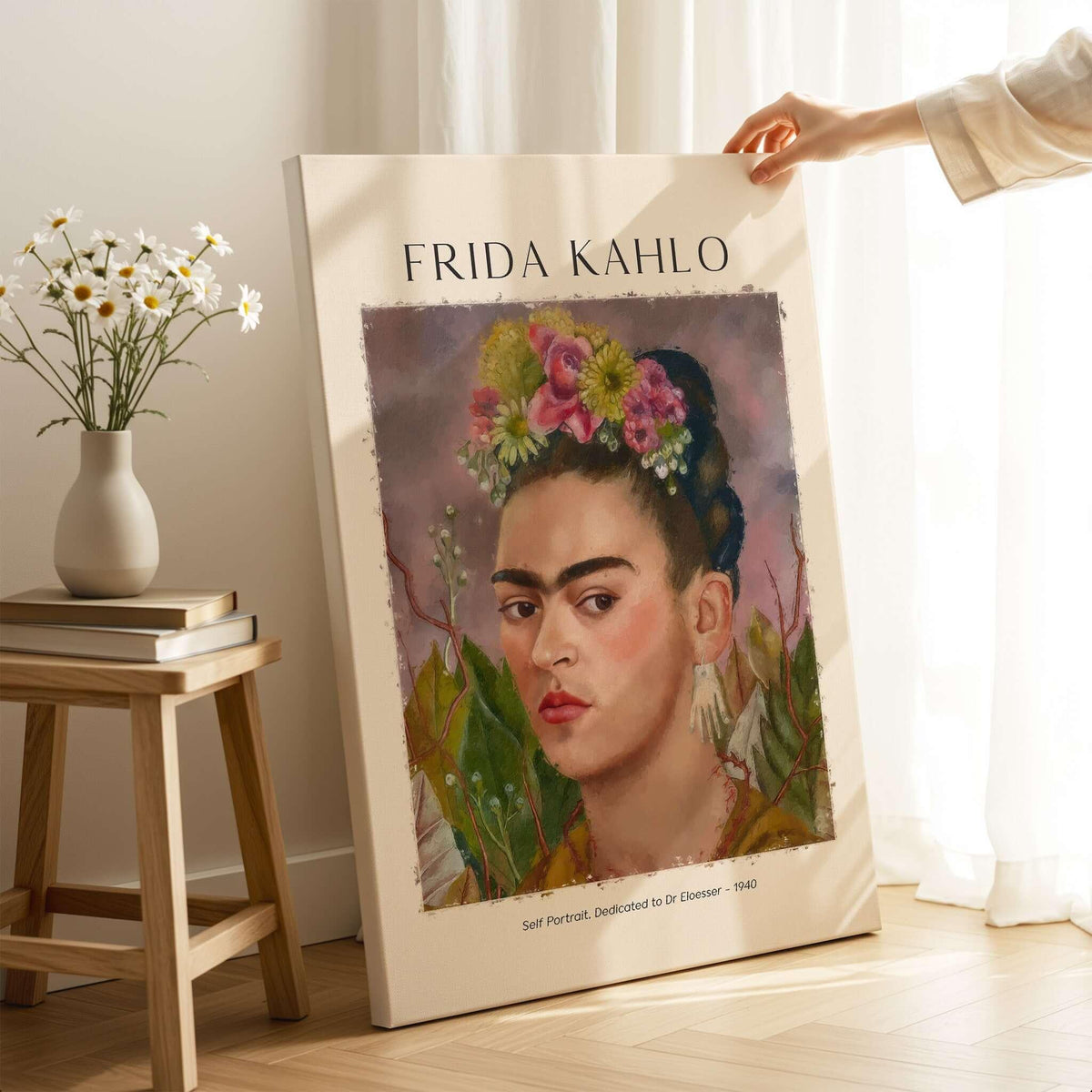 Frida Kahlo Self Portrait Dedicated Dr Eloesser Floral Poster Art Print displayed in a bright room next to a vase of flowers.