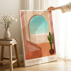 Galerie Bohème Moroccan Archway Cactus Art Print Terracotta Wall Decor Poster displayed in a stylish interior setting.