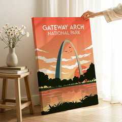 Hand holding Gateway Arch National Park canvas print in sunlit modern room decor setting