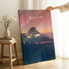 Hand holding Glacier National Park canvas print in bright modern room with flowers