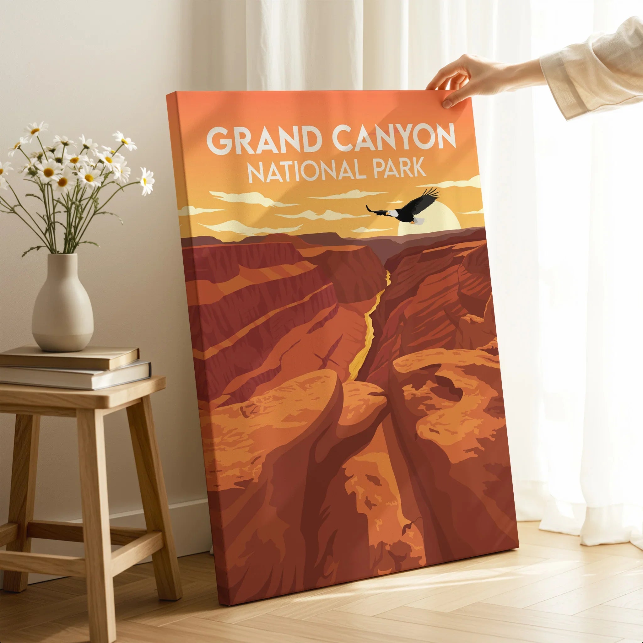 Grand Canyon National Park canvas print with sunset colors, held in modern room setting