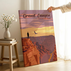 Grand Canyon National Park canvas print with sunset, hiker, and bird, held in modern room