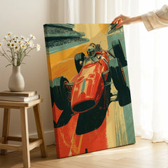Hand holding vintage race car wall art canvas in modern room with flowers and books