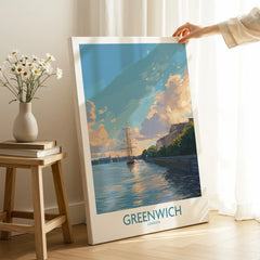 Greenwich London travel poster canvas print with ship and waterfront, hand holding artwork in bright room