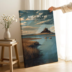 Holy Island Northumberland Travel Poster | Lindisfarne Castle Wall Art Print displayed on a table in a cozy setting.