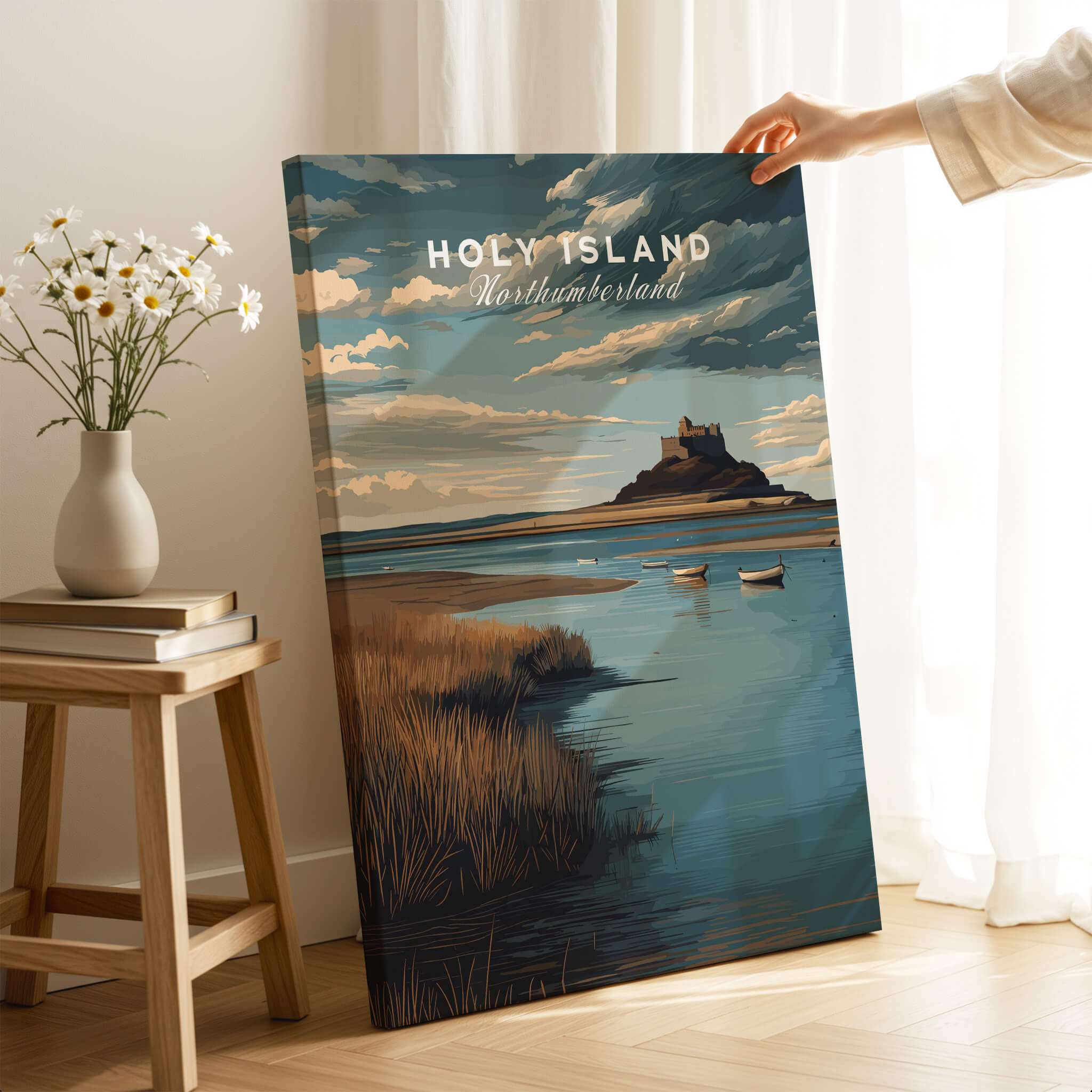 Holy Island Northumberland Travel Poster | Lindisfarne Castle Wall Art Print displayed on a table in a cozy setting.