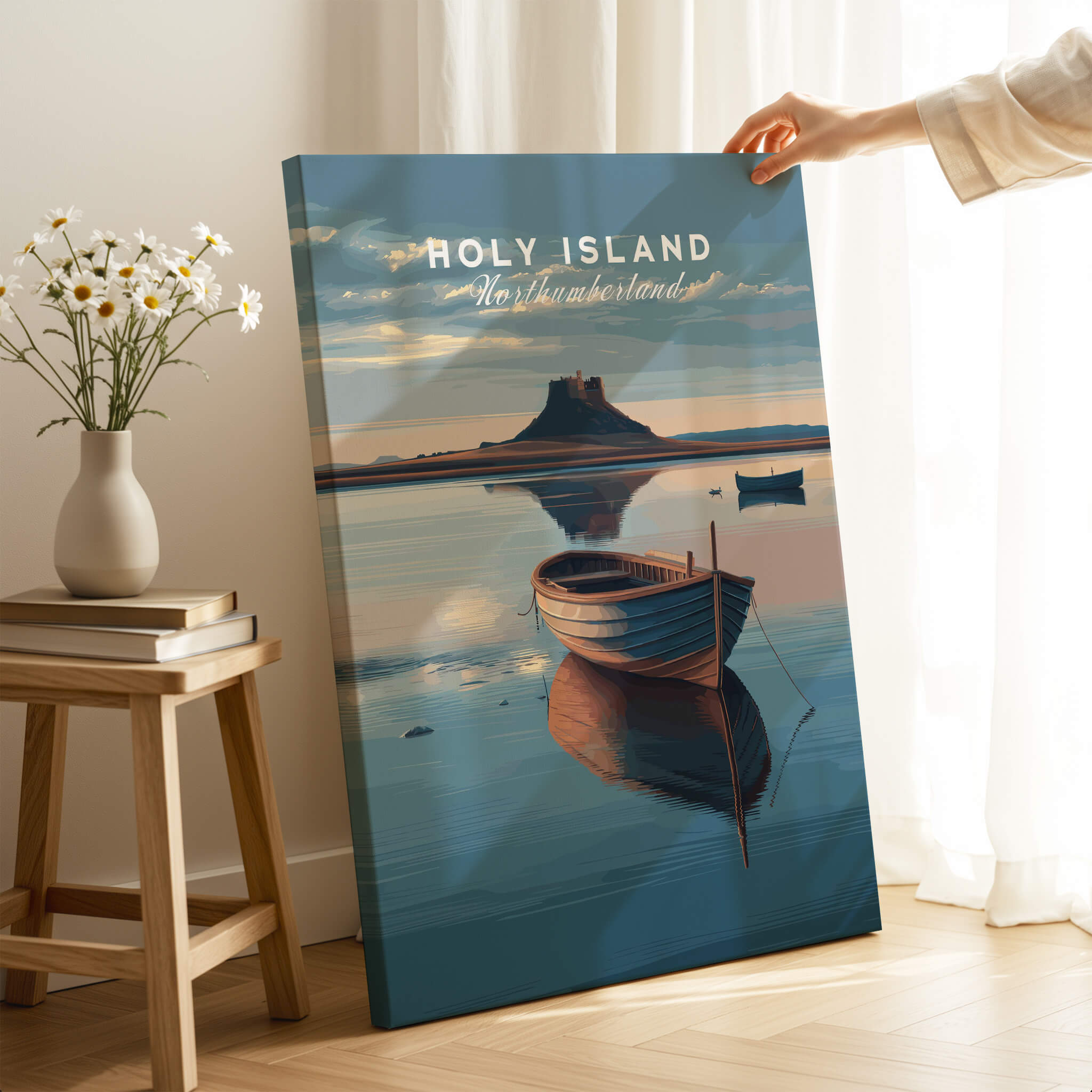 Holy Island Northumberland Wall Art Print | Serene Boat Scene Travel Poster displayed in a cozy room with flowers.