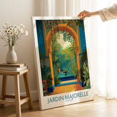 Jardim Majorelle Marrakesh Canvas Print | Tropical Oasis Landscape Poster displayed in a bright room with a floral arrangement.