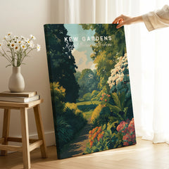 Hand holding Kew Gardens botanical garden canvas wall art in a bright, modern room