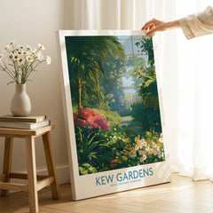 Kew Gardens travel poster canvas print with lush greenery, held in sunlit room