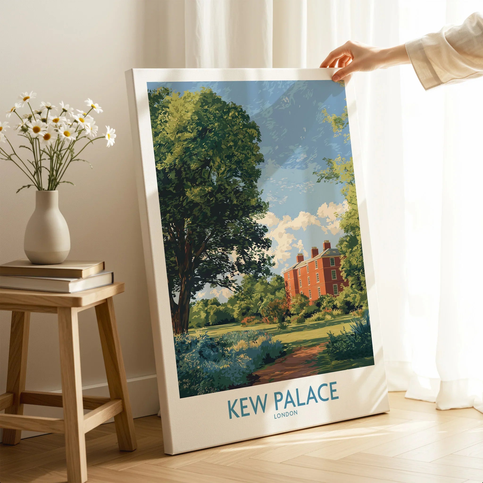 Kew Palace London art print with greenery, in bright modern room next to books and vase