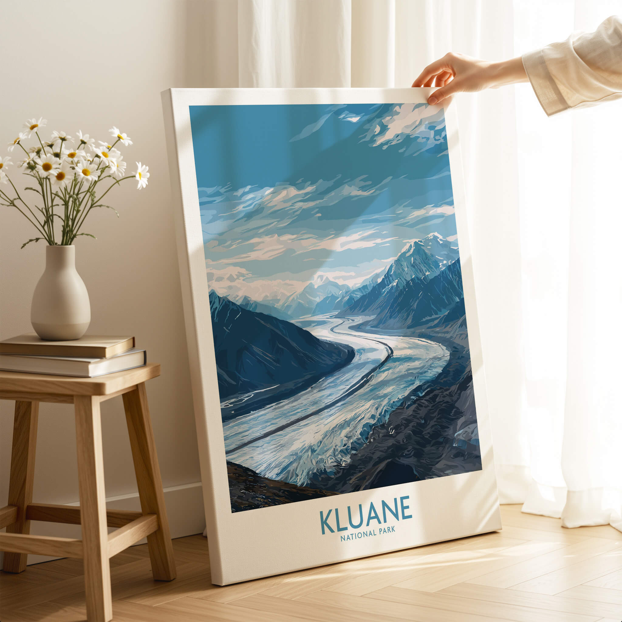 Kluane Poster National Park Canada | Snow Capped Mountains Canvas Print displayed in a bright room with flowers.