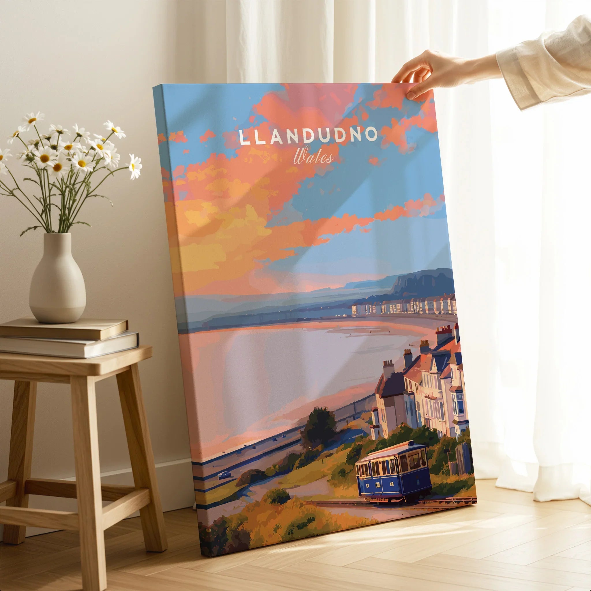 Llandudno Wales canvas print with sunset, coastal houses, and vintage tram in modern living room