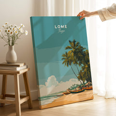 Lomé Togo Travel Posters | West African Beach & Palms Wall Art Print displayed in a cozy room with bright sunlight.