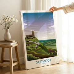 Dartmoor National Park travel poster canvas print, hand holding art in cozy room setting.