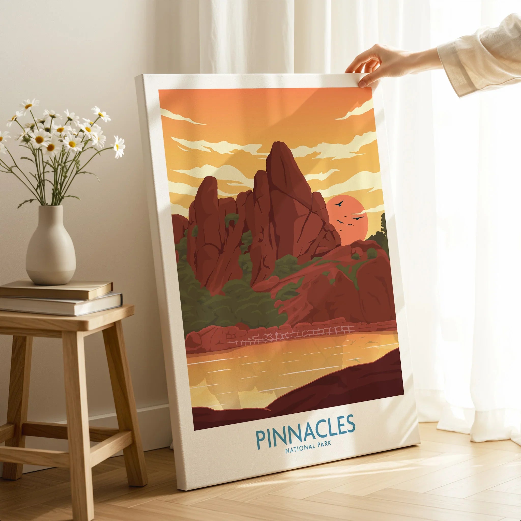 Pinnacles National Park canvas print with sunset landscape, hand holding artwork in cozy room