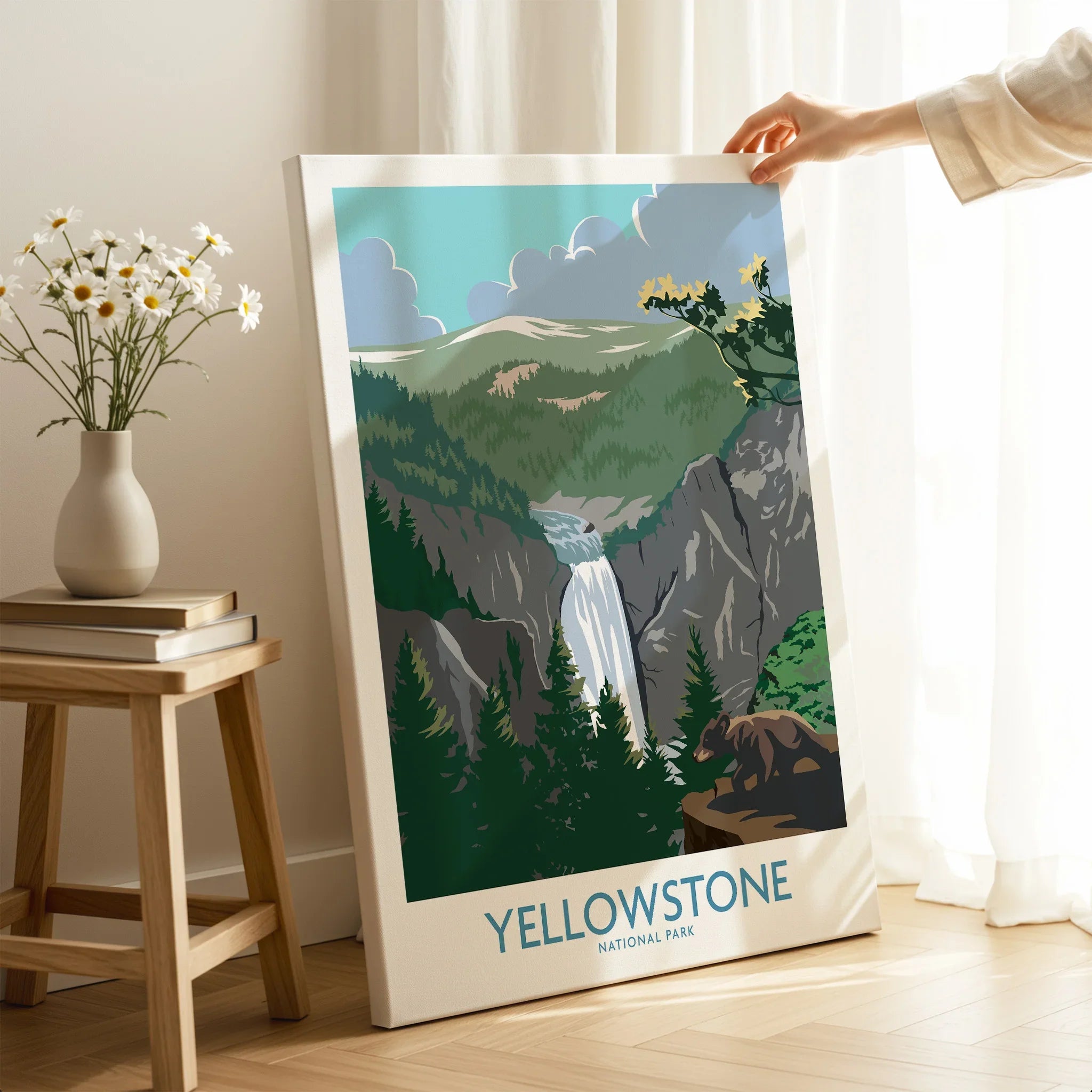 Yellowstone National Park canvas print with waterfall scenery, bear, and pine forest, held in cozy room