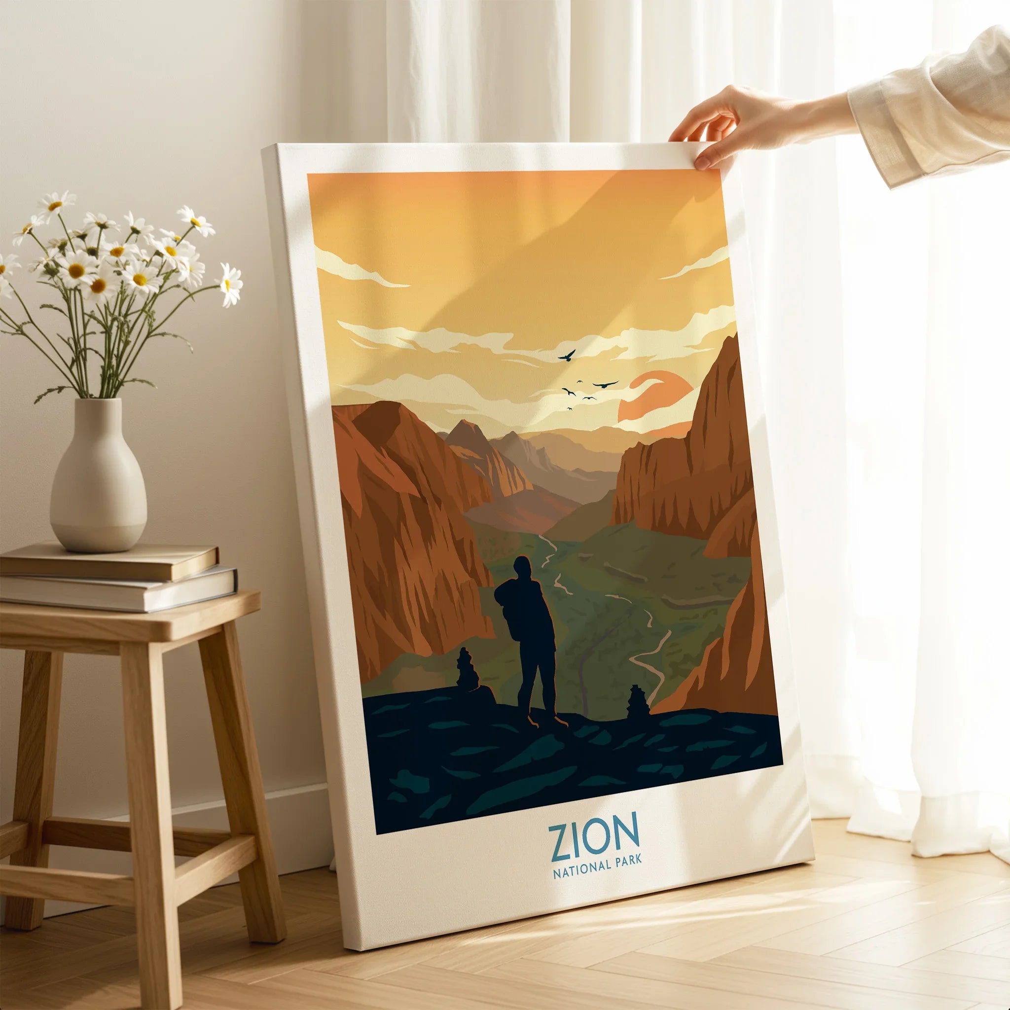 Zion National Park canvas print with hiker silhouette, displayed in a modern home setting.