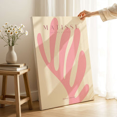 Matisse Art Prints -    Pink Coral Leaf Abstract Botanical Poster displayed in a warm, minimalist interior.