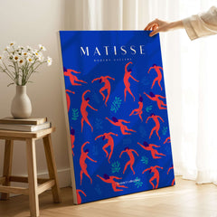 Matisse Art Prints - Dancing Figures Pattern Red Blue Poster displayed in a modern gallery setting with vibrant colors.