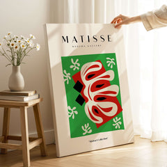 Matisse Art Prints -  Abstract Shape Red Green Poster displayed in a modern interior with vibrant colors and floral decor.