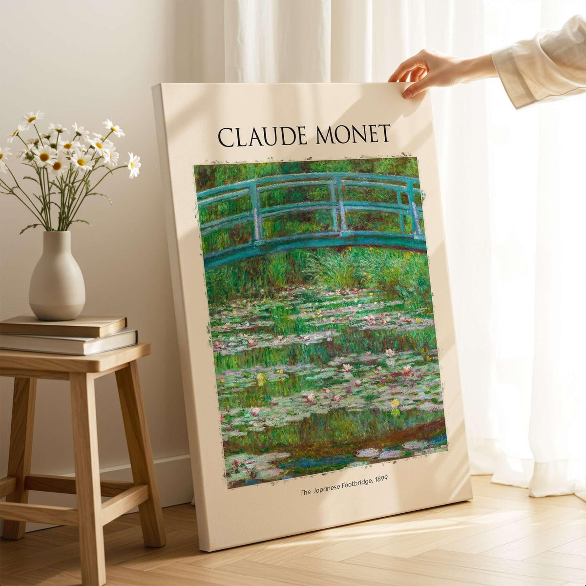 Monet Japanese Footbridge Water Lilies Giverny Garden Poster Art Print displayed in a cozy interior setting.